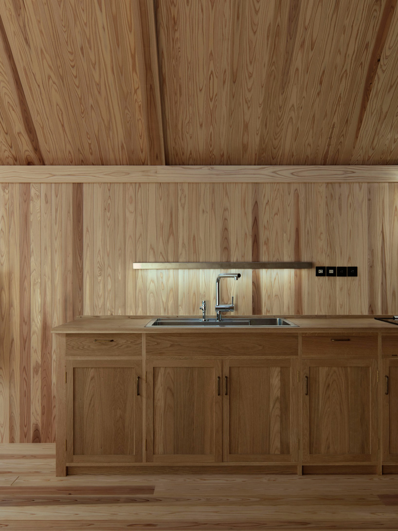 tomoaki uno architects completes wooden house in japan with blind street façade