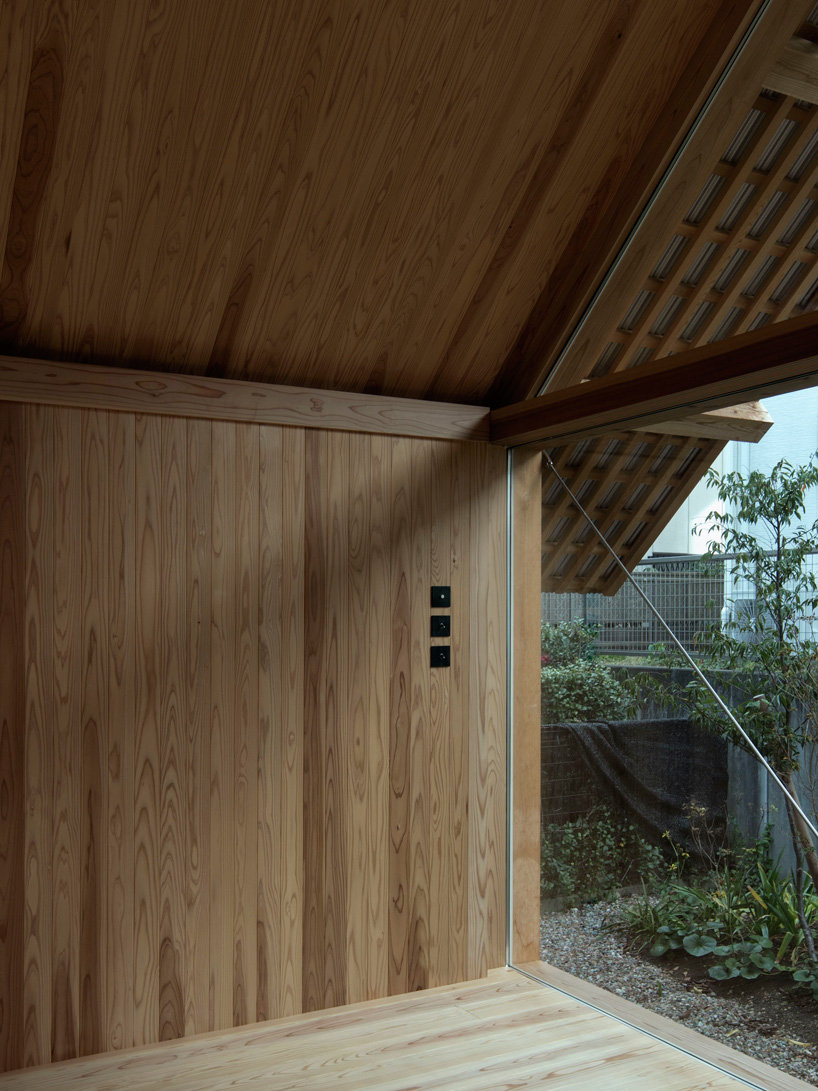tomoaki uno architects completes wooden house in japan with blind street façade