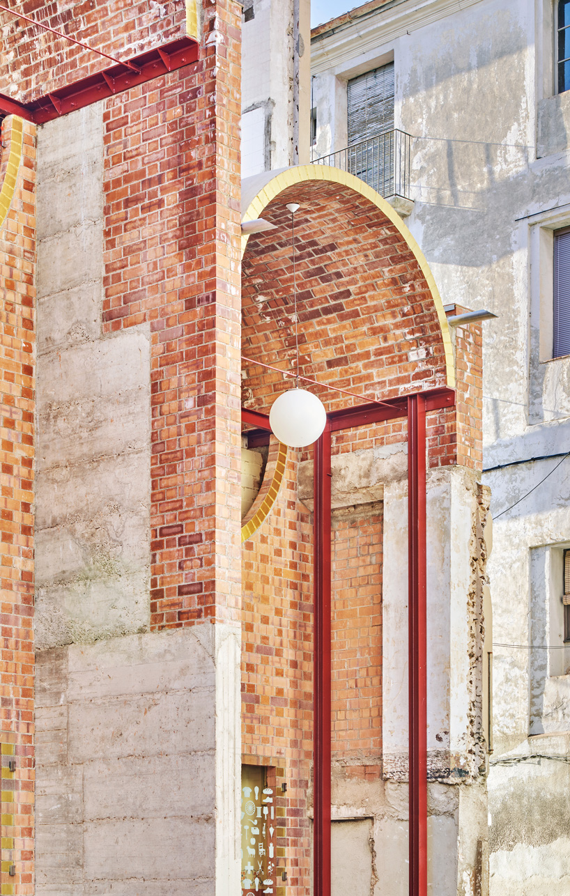  unparelld'arquitectes adds inhabitable brick façade to party wall in olot, spain