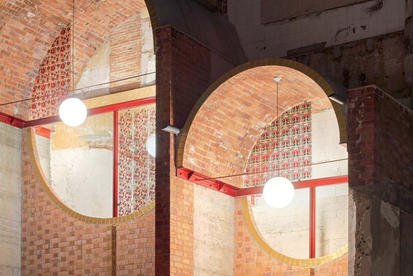 unparelld'arquitectes adds inhabitable brick façade to party wall in olot, spain