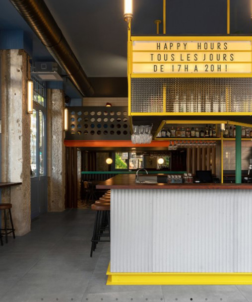 un studio's colorful bar design in lyon references prouvé, le corbusier + matégot