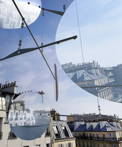 vincent leroy filters reality with 'floating lens' installation on parisian rooftops