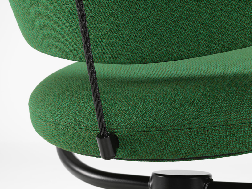 cantilevered cushions form swinging VITRA citizen armchair by konstantin grcic