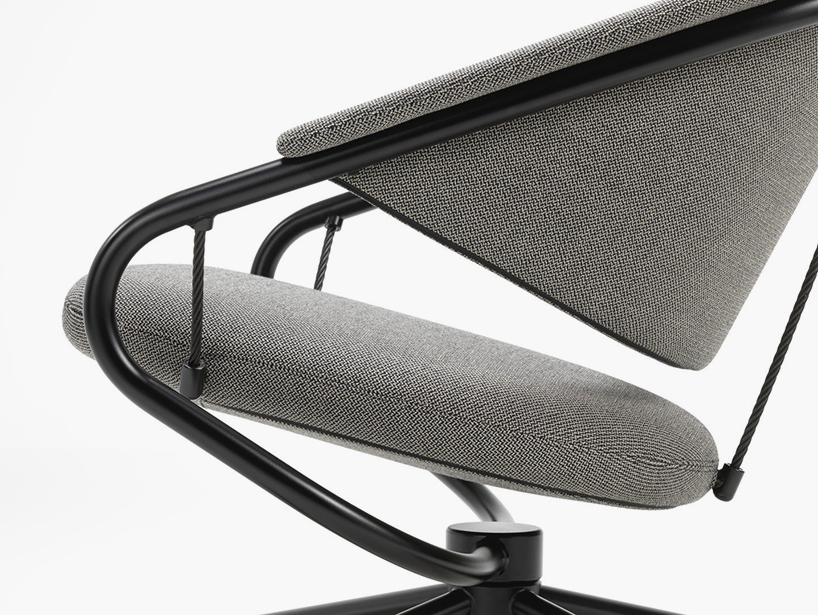 cantilevered cushions form swinging VITRA citizen armchair by konstantin grcic