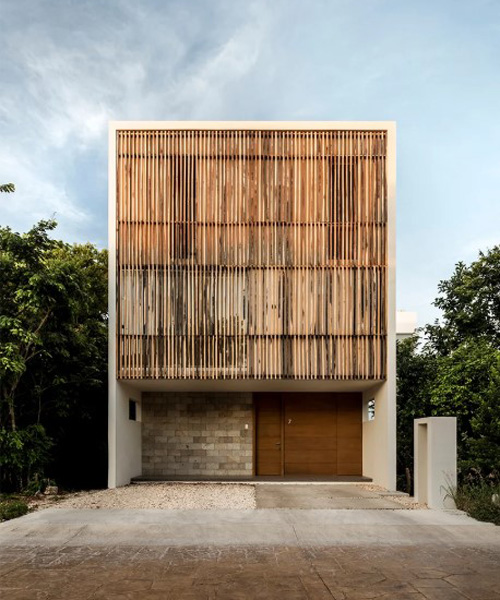 warm architects applies tropical wood in ‘ciruelo 7’ house in cancún, mexico