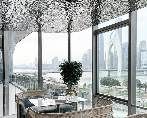 wuji studio installs reflective riverlike ceiling within 'rêver • 玥' restaurant in china