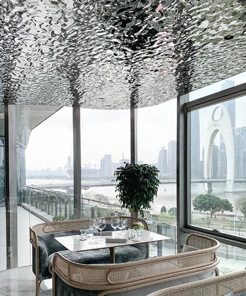 wuji studio installs reflective riverlike ceiling within 'rêver • 玥' restaurant in china