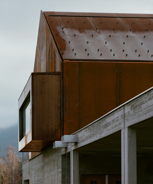corten steel school in lugrin, france by ateliers o-s architectes overlooks lake geneva