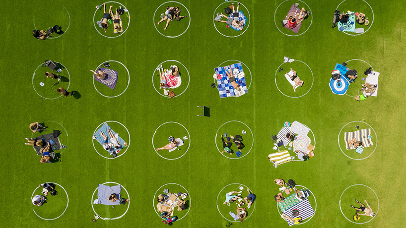 domino park painted circles on the grass to ensure social distancing