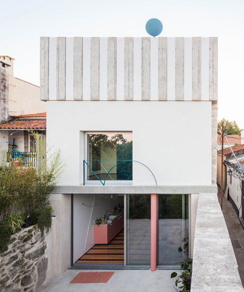 stripes and curved surfaces make fala atelier's house in fontaínhas, porto