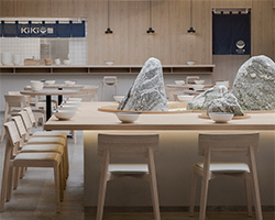 golucci adds rock-like formations within 'kiki' noodle house in shanghai