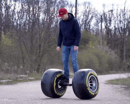 the Q installs formula 1 wheels on a regular hoverboard