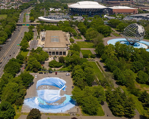 jorge rodríguez-gerada spray paints 27,000 sq ft doctor mural in queens parking lot, new york