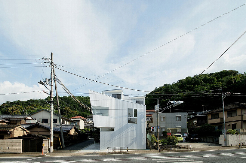 kensaku tohmoto architects combines house with gallery in otsu, japan