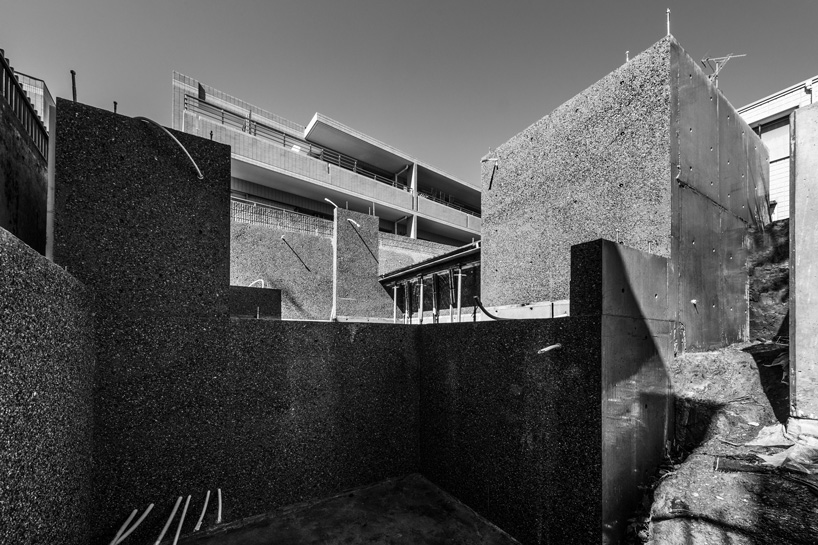 Kiyoaki Takeda's wooden house with five retaining walls in Tokyo connects nature with the artifact