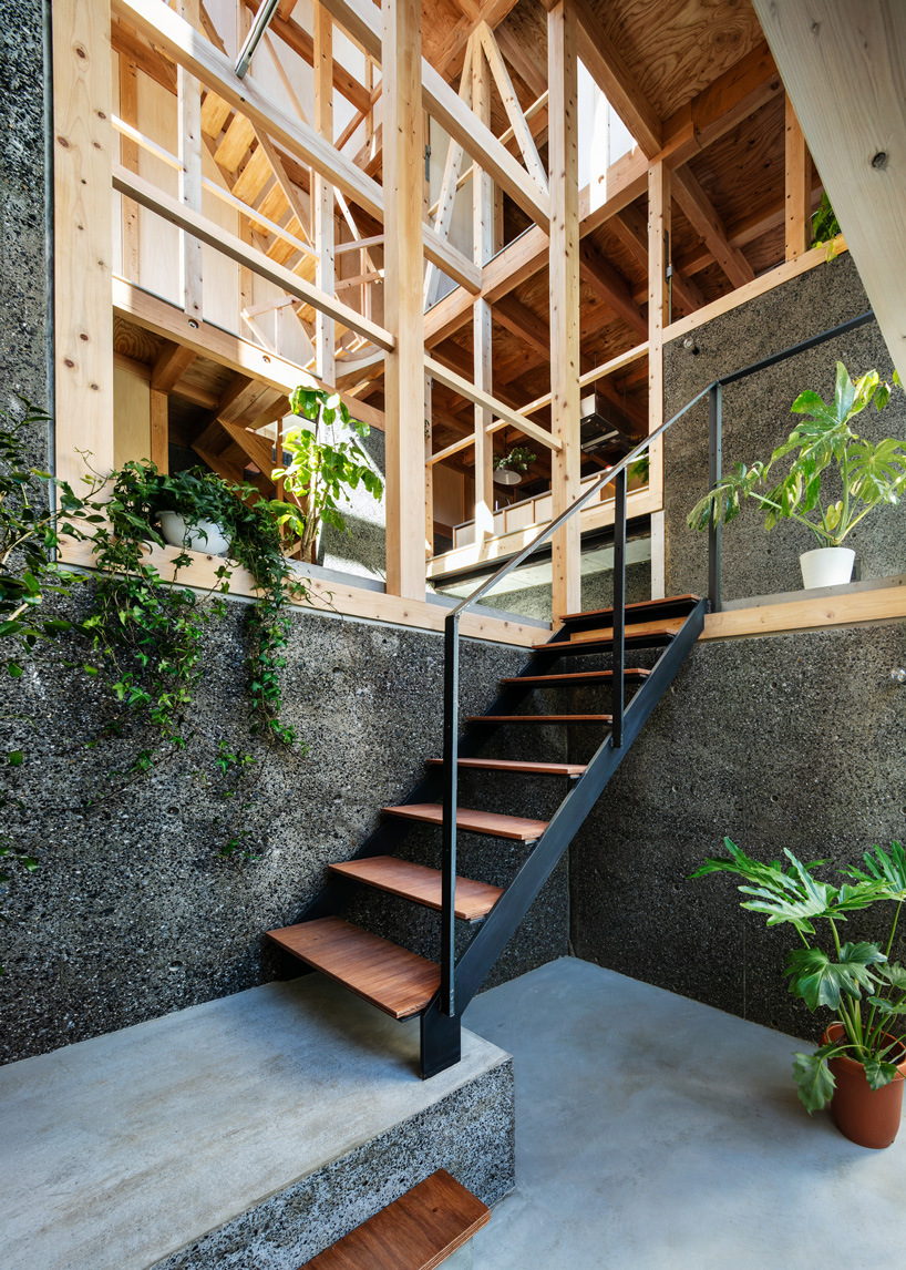 Kiyoaki Takeda's wooden house with five retaining walls in Tokyo connects nature with the artifact