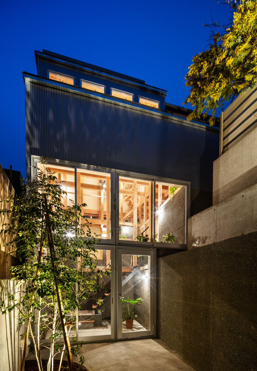 Kiyoaki Takeda's wooden house with five retaining walls in Tokyo connects nature with the artifact