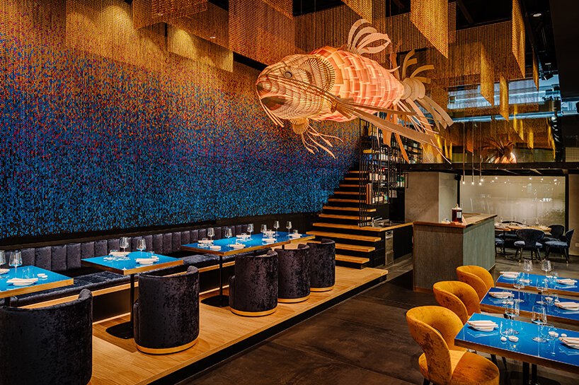 kriskadecor's bespoke, colorful wave-like chain curtains define spaces