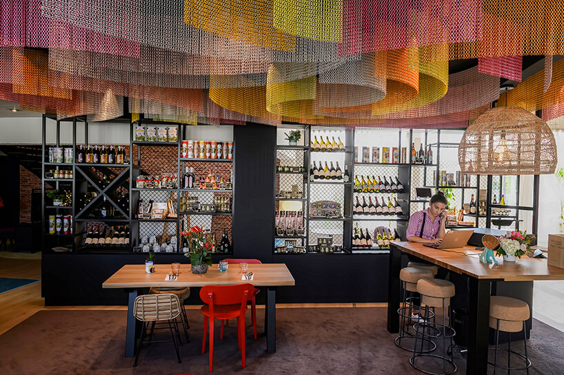 kriskadecor's bespoke, colorful wave-like chain curtains define spaces