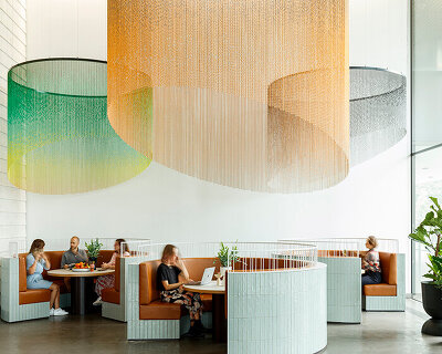 kriskadecor's bespoke, colorful wave-like chain curtains define spaces
