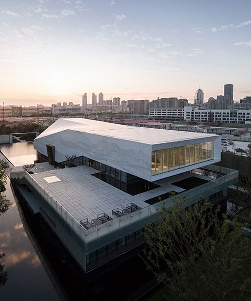 lacime architects uses simple geometry to design an exhibition hall in suzhou, china