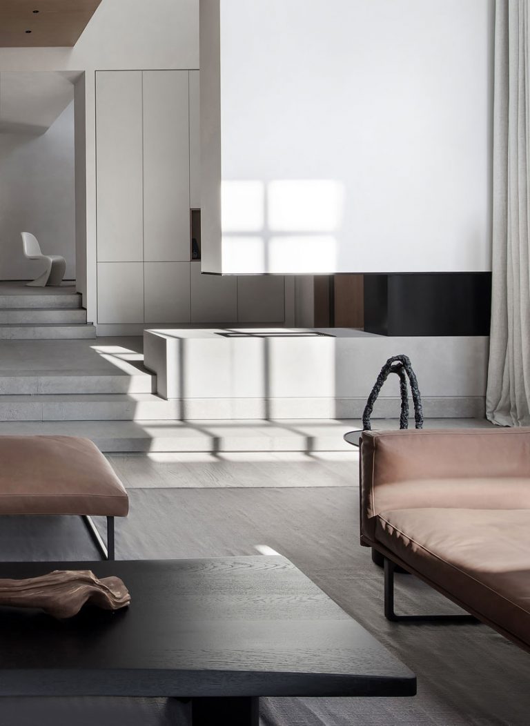 liang architecture inserts a light-filled atrium into apartment in china