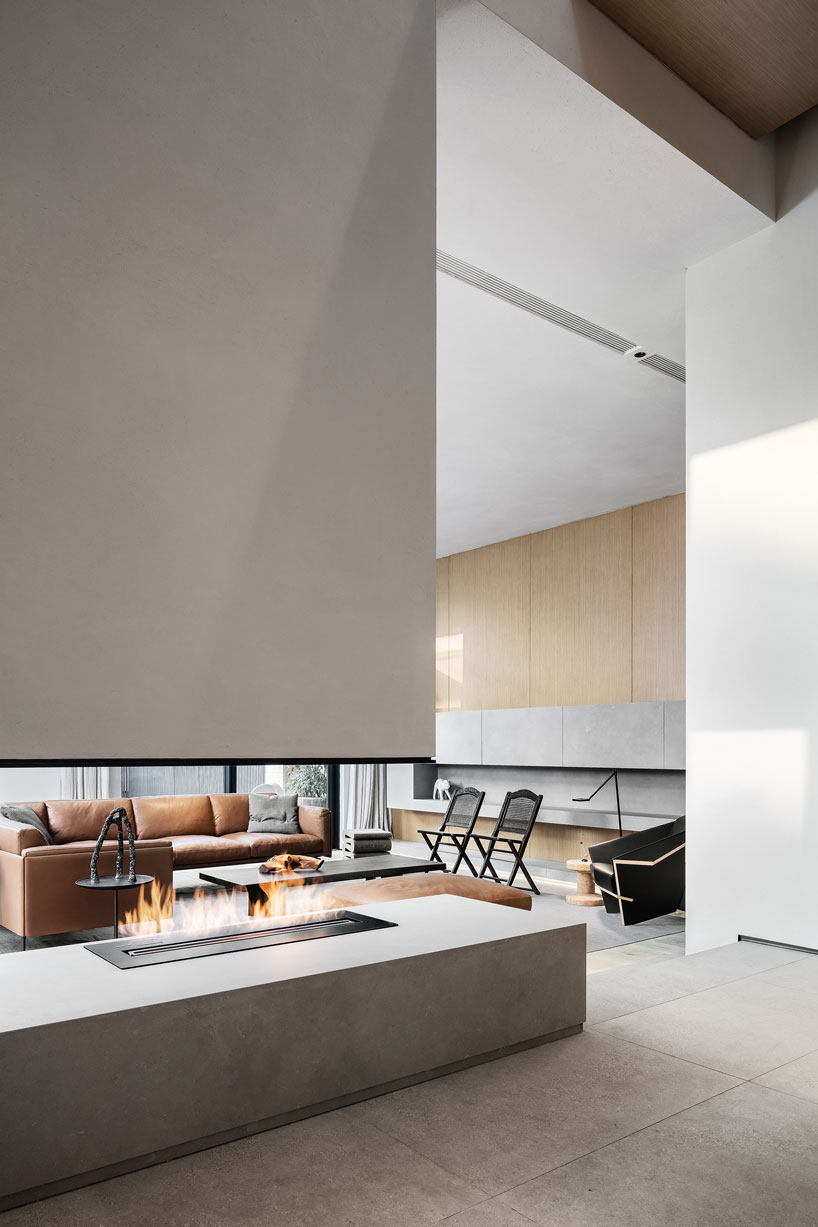 liang architecture inserts a light-filled atrium into apartment renovation in china designboom