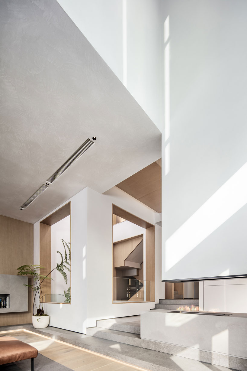 liang architecture inserts a light-filled atrium into apartment renovation in china designboom