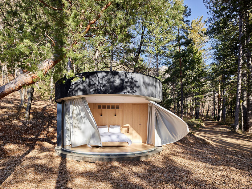 LUMIPOD cabin's curved glazed façade immerses visitors in nature