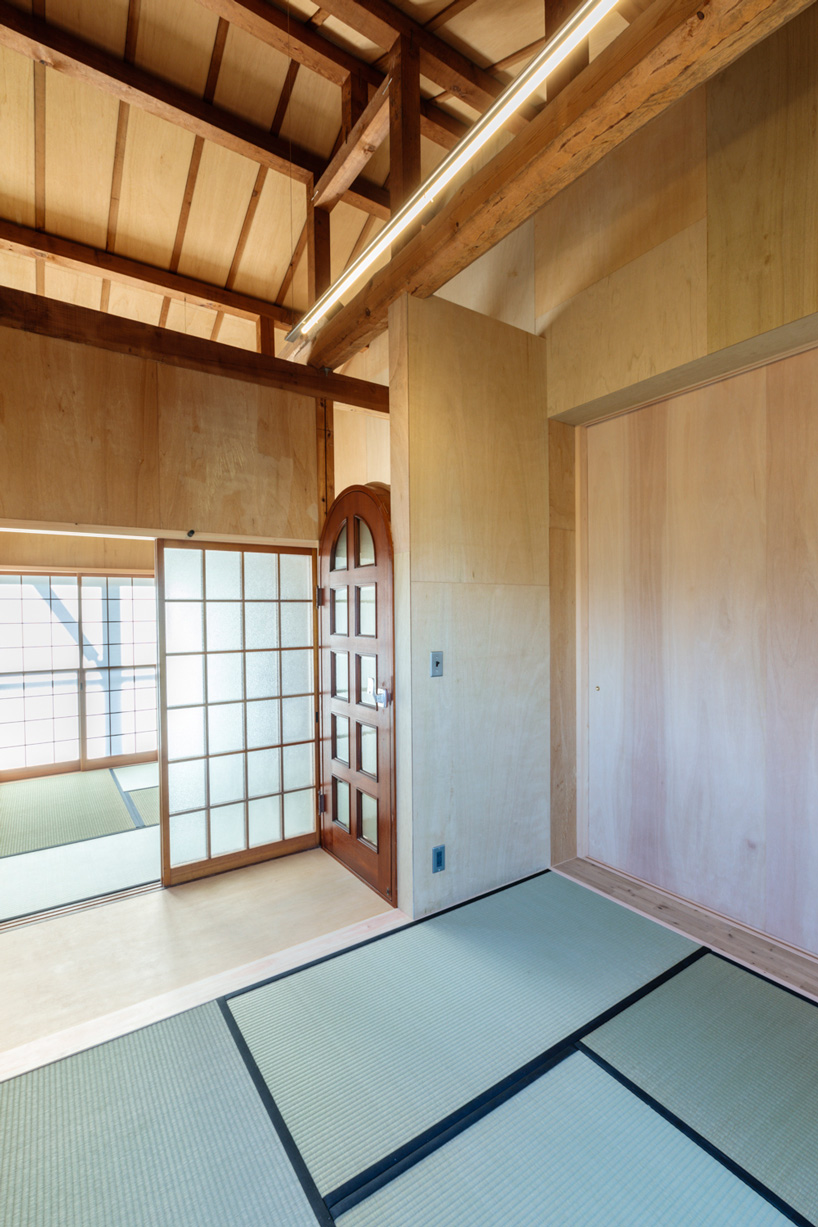 maki yoshimura adds lifted volume to 'house in nishisakabe' renovation in japan