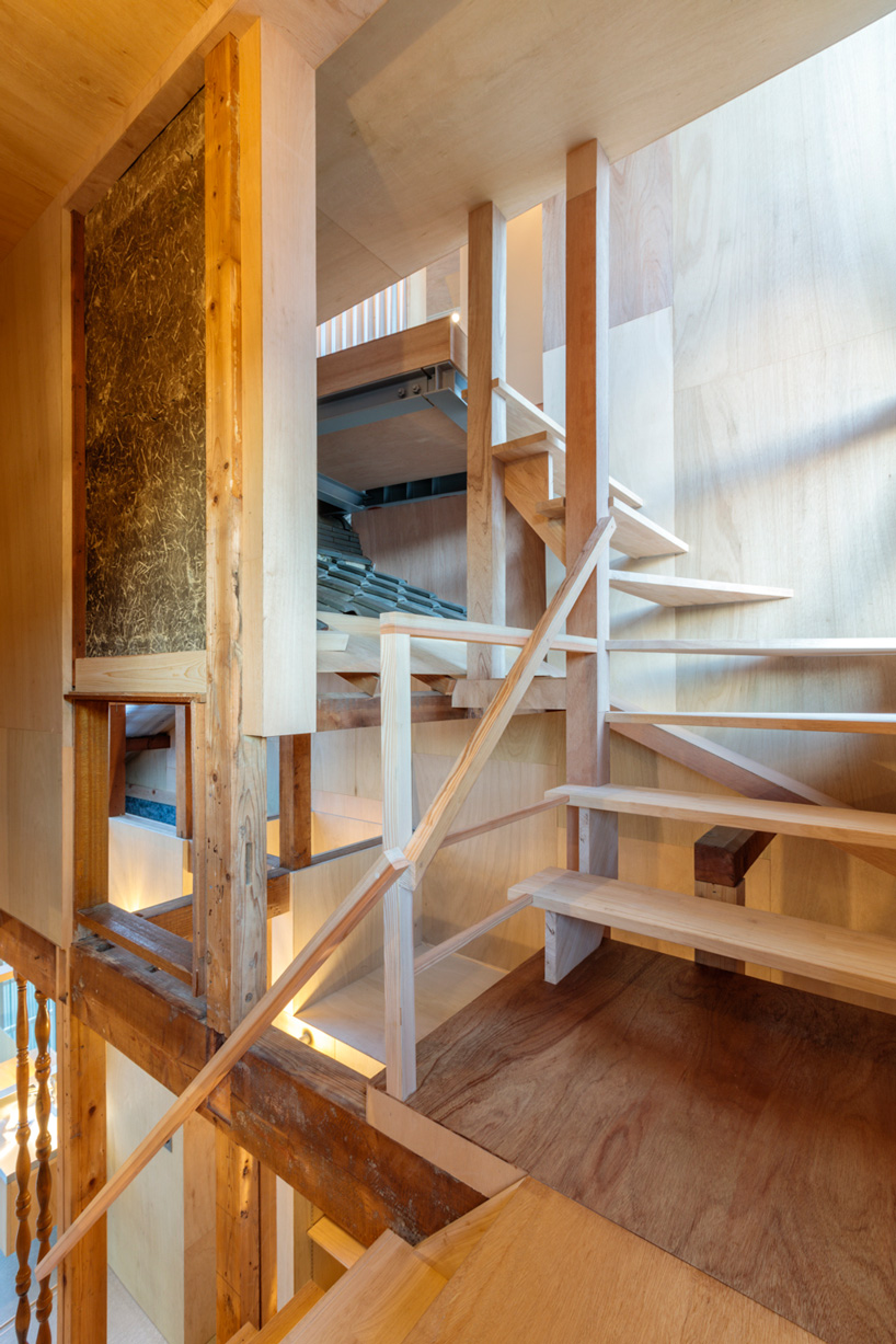 maki yoshimura adds lifted volume to 'house in nishisakabe' renovation in japan