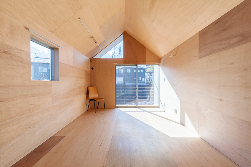 maki yoshimura adds lifted volume to 'house in nishisakabe' renovation in japan