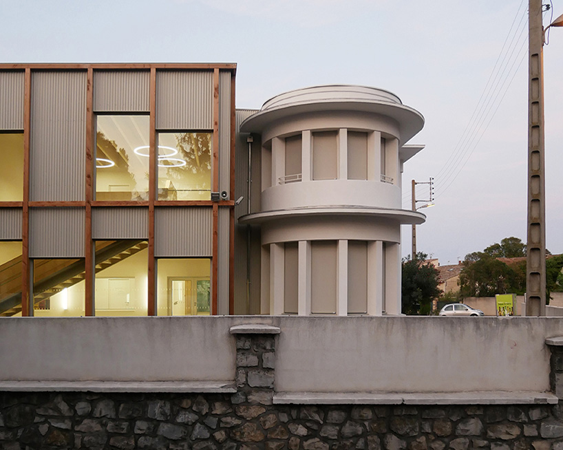 NAS architecture inserts wooden extension to old nursery school in france