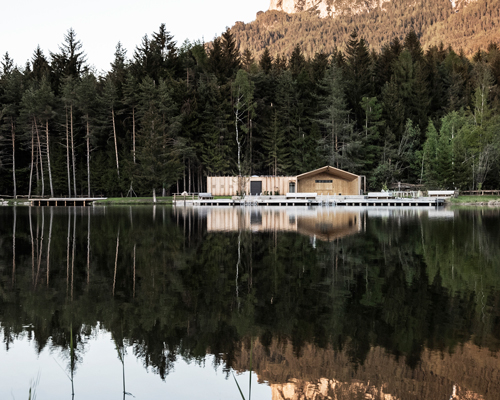 noa* sites contemporary tyrolean 'lake house völs' among forests of northern italy