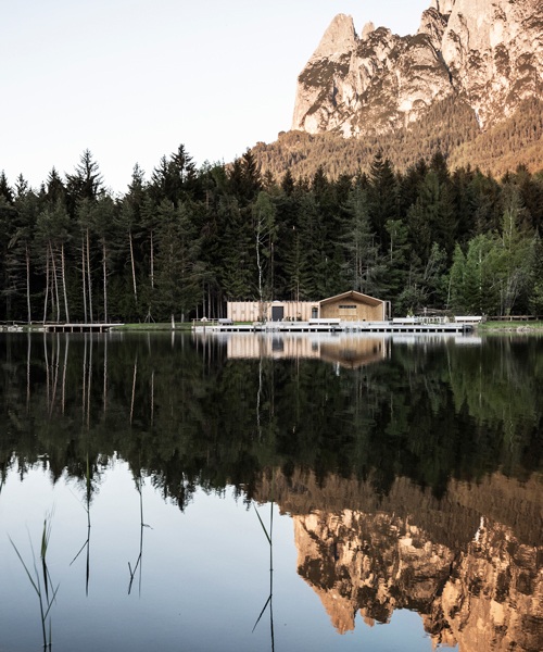 noa* sites contemporary tyrolean 'lake house völs' among forests of northern italy