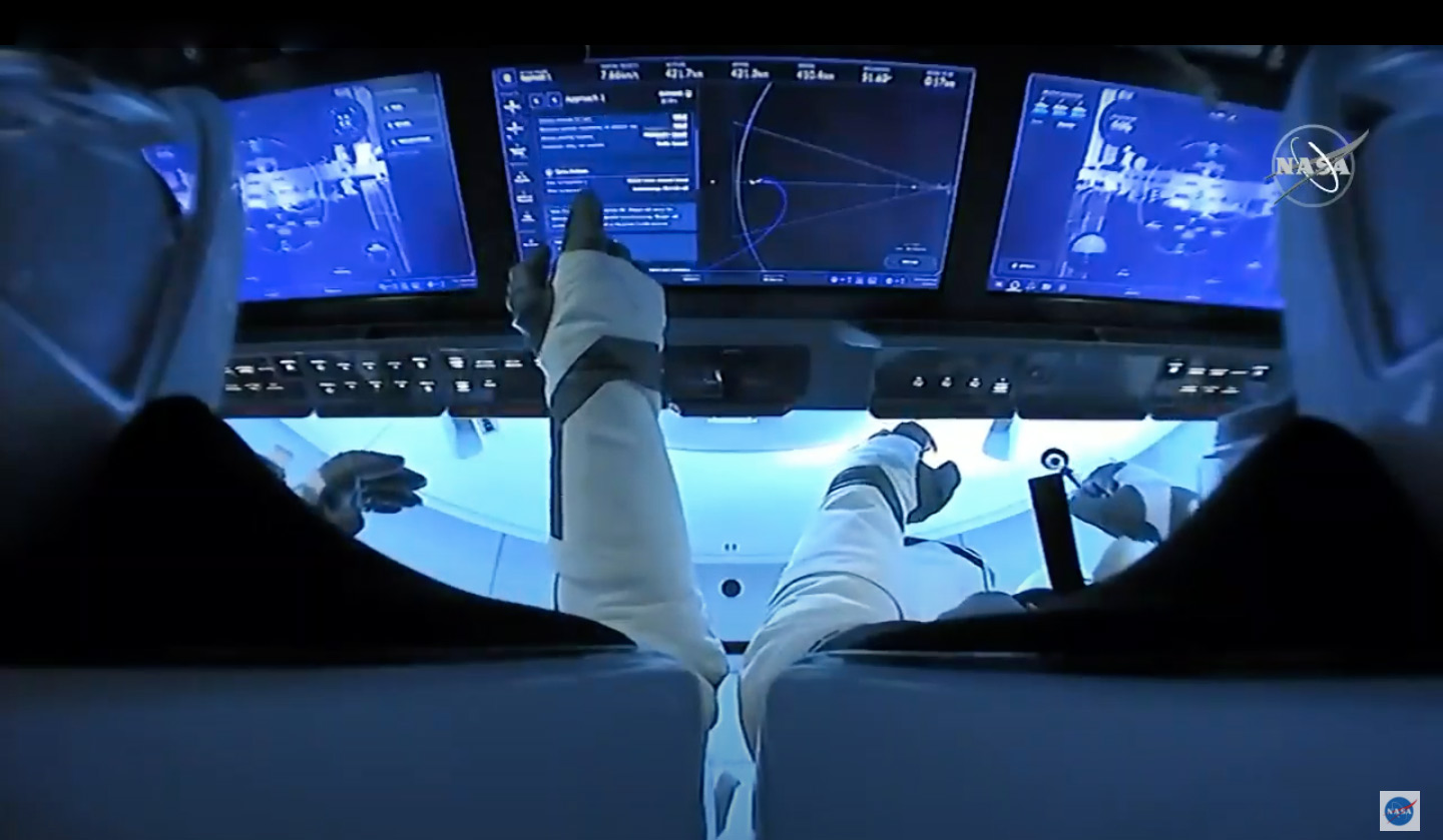 watch live: SpaceX + NASA astronauts successfully dock at the international space station