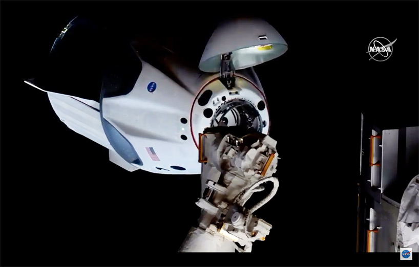 watch live: SpaceX + NASA astronauts successfully dock at the international space station