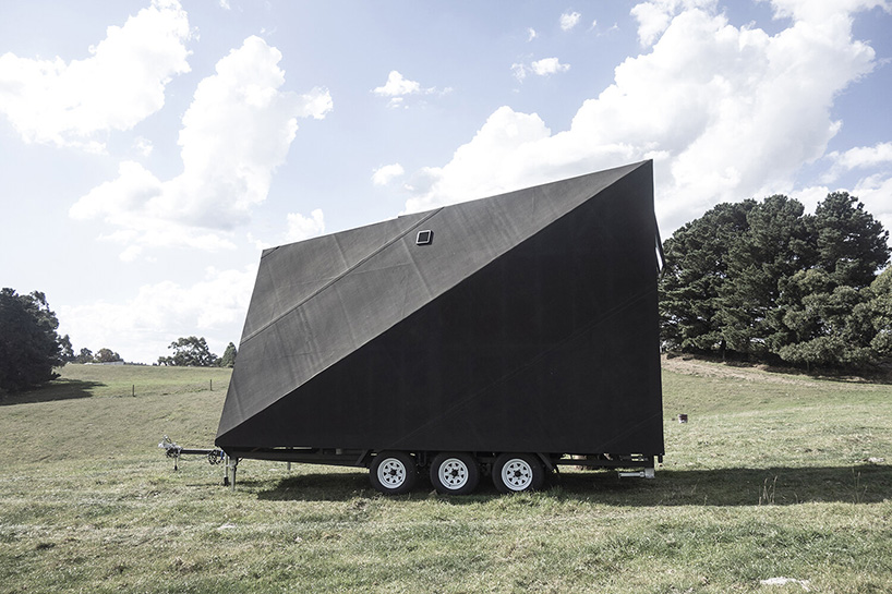 base cabin - studio edwards puts a sleek, black A-frame cabin on wheels