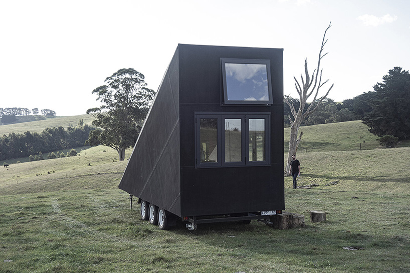 base cabin - studio edwards puts a sleek, black A-frame cabin on wheels