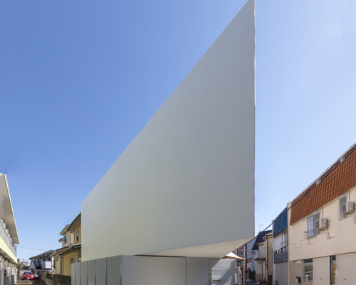 narrow cantilevered volume defines international royal architecture 's spiral house in tokyo