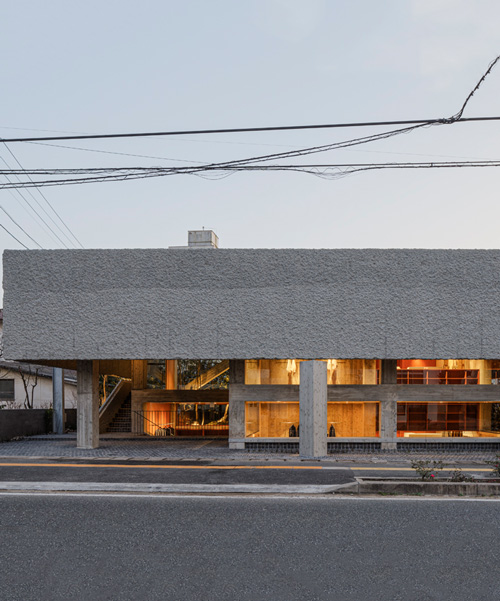 toru shimokawa wraps concrete 'belt' around boutique clothing store in japan