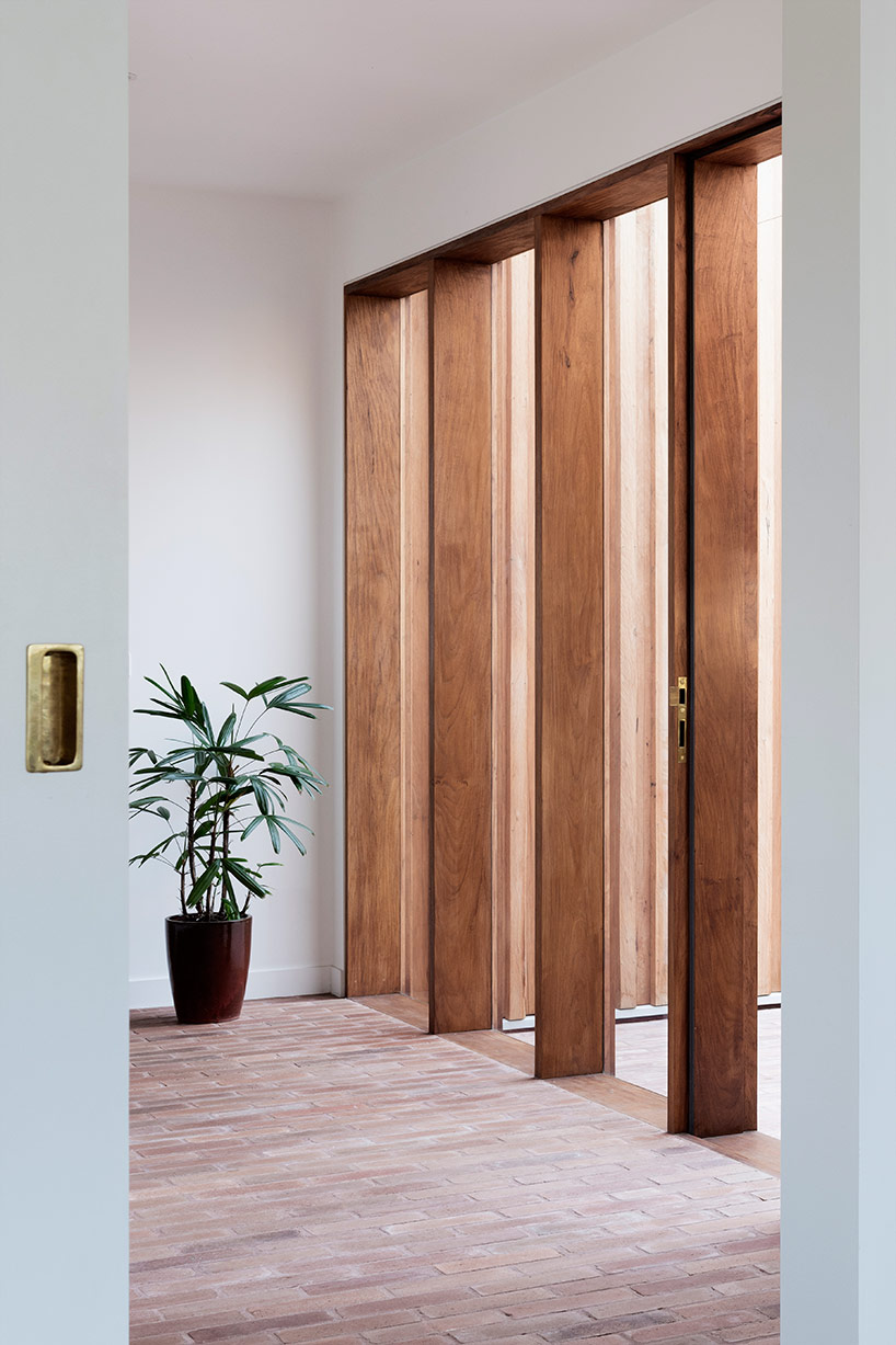 TRIAS conceives 'three piece house' as a collection of pavilions in timber and brick