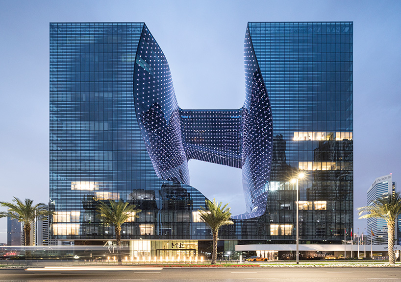 zaha hadid's 'opus' building in dubai photographed by laurian ghinitoiu