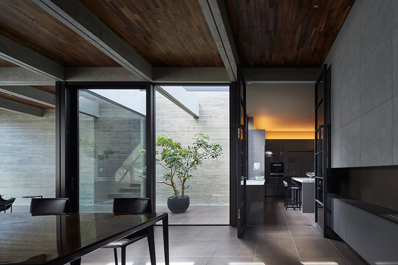 apollo architects builds 'ortho' residence in japan with massive offset concrete volumes