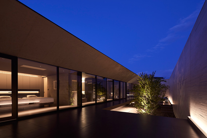 apollo architects builds 'ortho' residence in japan with massive offset concrete volumes