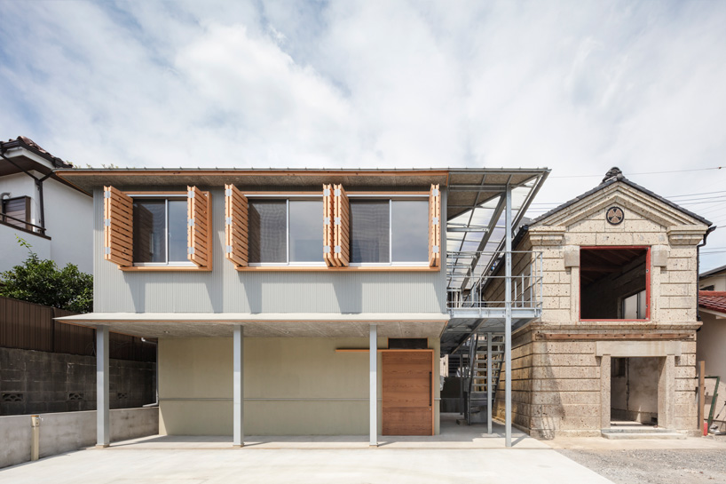 araki + sasaki architects combines three volumes into one residential complex in asaka, japan
