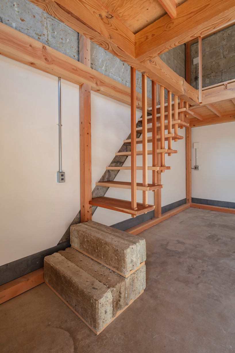 araki + sasaki architects combines three volumes into one residential complex in asaka, japan