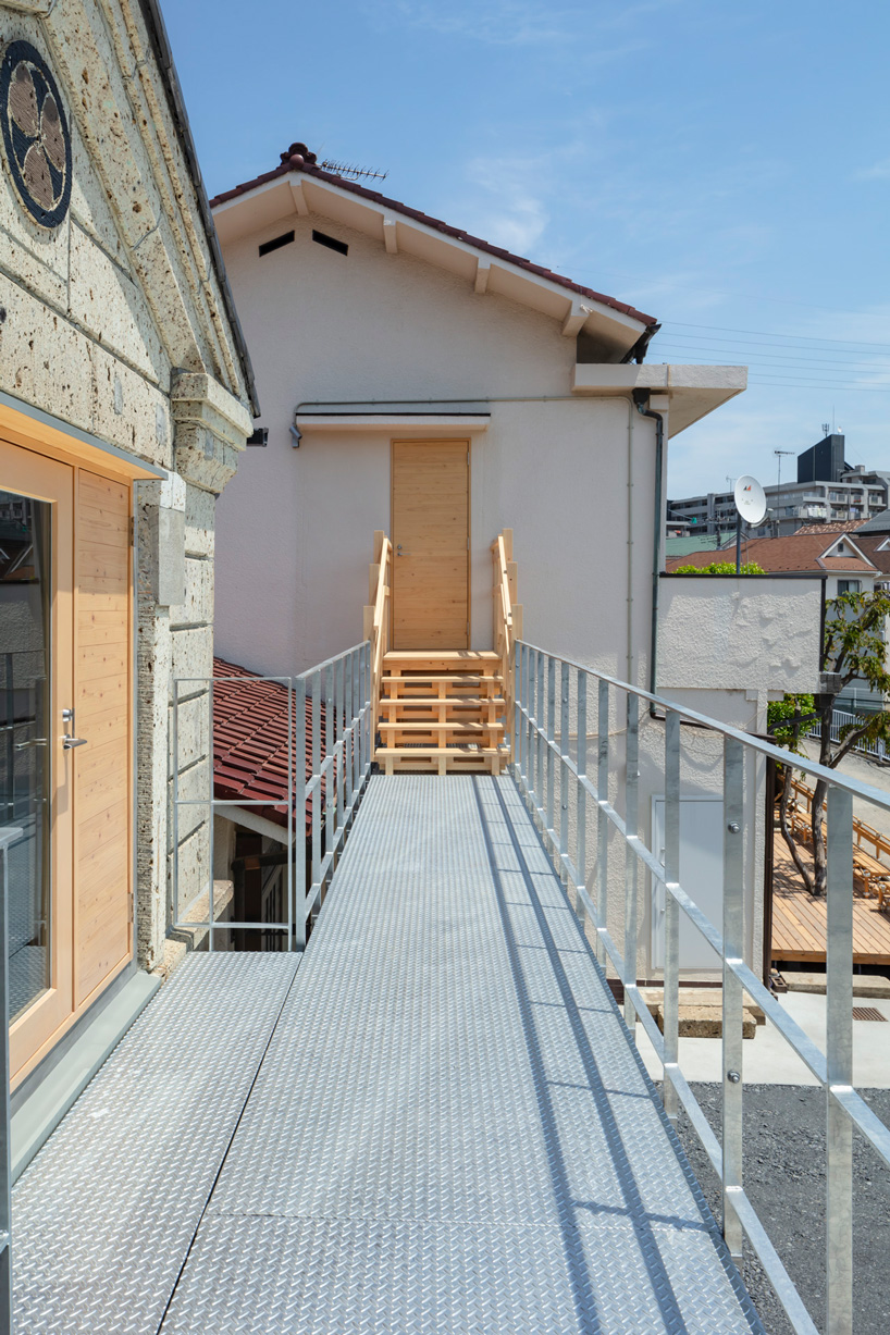 araki + sasaki architects combines three volumes into one residential complex in asaka, japan