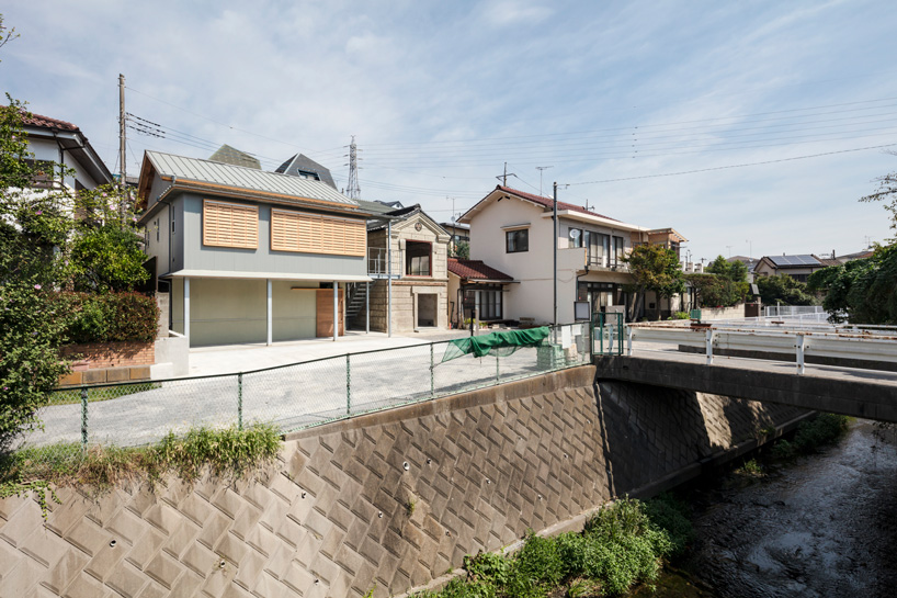 araki + sasaki architects combines three volumes into one residential complex in asaka, japan