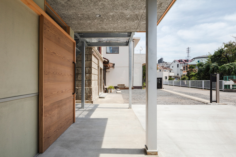 araki + sasaki architects combines three volumes into one residential complex in asaka, japan